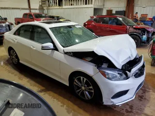 2014 Mercedes-Benz E 400 Sport with VIN WDDHF9FBXEA936424, listed as a Copart auction lot 83331224 with 194,689 mi miles and Salvage Title. Bid and sale history available at DreamBid. Image 4.