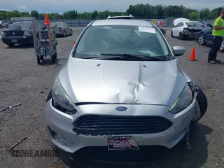 2017 Ford Focus SE with VIN 1FADP3FE4HL295573, listed as a IAAI auction lot 39562568 with 96,939 mi miles and . Bid and sale history available at carsss.com. Image 12.