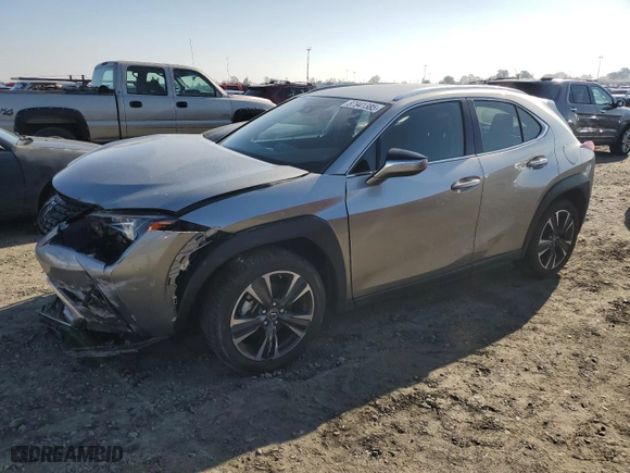 2022 Lexus UX with VIN JTHX3JBHXN2056083, listed as a Copart auction lot 87941385 with 8,469 mi miles and Salvage Title. Bid and sale history available at carsss.com. Image 1.