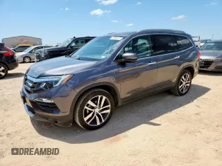 2017 Honda Pilot Touring with VIN 5FNYF6H92HB099828, listed as a Copart auction lot 61589115 with 53,161 mi miles and Clean title. Bid and sale history available at DreamBid. Image 1.