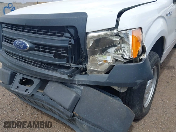 2014 Ford F-150 XL with VIN 1FTMF1CM4EKE98669, listed as a IAAI auction lot 41927986 with 133,246 mi miles and . Bid and sale history available at DreamBid. Image 6.
