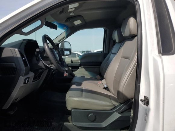 2018 Ford Super Duty F-250 SRW XL with VIN 1FDBF2B60JEC06830, listed as a Copart auction lot 84163034 with 123,540 mi miles and Salvage Title. Bid and sale history available at carsss.com. Image 7.