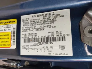 2019 Ford Fusion Energi Titanium with VIN 3FA6P0SU0KR111372, listed as a IAAI auction lot 41685702 with 107,407 mi miles. Bid and sale history available at carsss.com. Image 9.