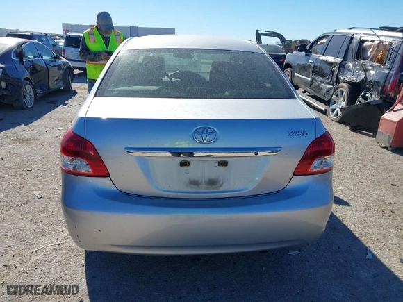 2012 Toyota Yaris with VIN JTDBT4K35CL038860, listed as a IAAI auction lot 41254384 with 161,536 mi miles. Bid and sale history available at carsss.com. Image 17.