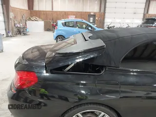 2014 BMW M6 z VIN WBSLZ9C58EDZ78401, wystawiony jako IAAI lot #41840114 z przebiegiem 23 499 mil mil oraz . Historia ofert i sprzedaży dostępna na DreamBid. Obrazek 19.