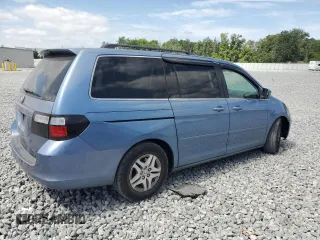 2007 Honda Odyssey EX with VIN 5FNRL38457B052131, listed as a Copart auction lot 55226575 with 165,745 mi miles and Salvage Title. Bid and sale history available at DreamBid. Image 3.