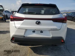 2025 Lexus UX with VIN JTHYBJAHXS2013108, listed as a Copart auction lot 45136895 with 1,350 mi miles and Salvage title. Bid and sale history available at DreamBid. Image 6.