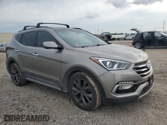 2017 Hyundai Santa Fe Ultimate with VIN 5XYZW4LA4HG488067, listed as a Copart auction lot 54984005 with 100,784 mi miles and Salvage title. Bid and sale history available at DreamBid. Image 4.