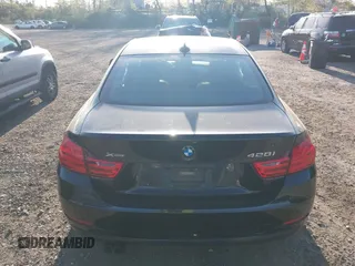 2014 BMW 4 Series 428i xDrive with VIN WBA3N9C55EF721295, listed as a IAAI auction lot 42139256 with 85,472 mi miles and . Bid and sale history available at carsss.com. Image 16.