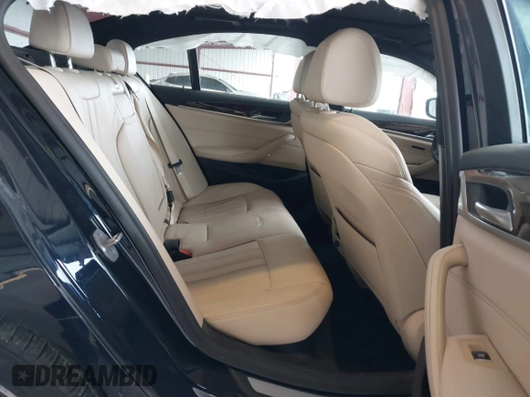 2019 BMW 5 Series 530e with VIN WBAJA9C50KB254535, listed as a IAAI auction lot 41094049 with 57,874 mi miles and . Bid and sale history available at DreamBid. Image 8.