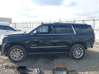 2015 GMC Yukon Denali with VIN 1GKS1CKJ8FR612971, listed as a IAAI auction lot 41519689 with 197,003 mi miles. Bid and sale history available at carsss.com. Image 14.