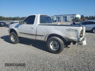 1998 Ford F-150 with VIN 1FTZF18W3WNB98041, listed as a Copart auction lot 77530824 with 194,712 mi miles and Salvage title. Bid and sale history available at DreamBid. Image 2.