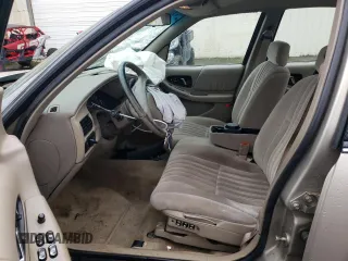 1996 Buick Regal Custom with VIN 2G4WB52K7T1426501, listed as a Copart auction lot 84858184 with 89,553 mi miles and Salvage title. Bid and sale history available at DreamBid. Image 7.