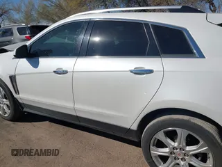 2013 Cadillac SRX Performance Collection with VIN 3GYFNDE37DS599557, listed as a IAAI auction lot 41633569 with 100,611 mi miles and . Bid and sale history available at DreamBid. Image 14.