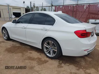 2018 BMW 3 Series 330i with VIN WBA8B9C59JEE82660, listed as a IAAI auction lot 41899267 with 65,205 mi miles and . Bid and sale history available at DreamBid. Image 3.