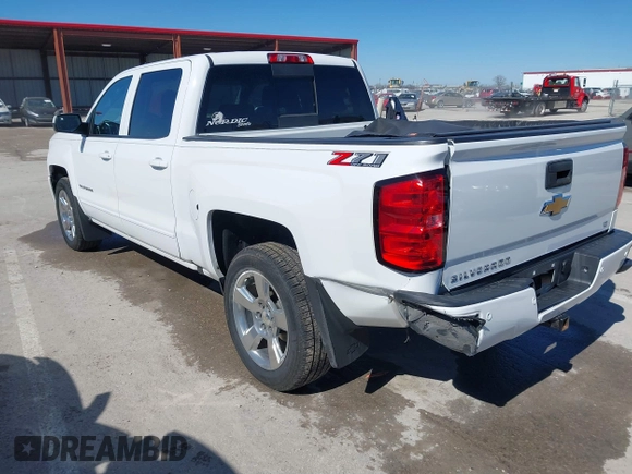 2018 Chevrolet Silverado 1500 LT with VIN 3GCUKREC3JG634354, listed as a IAAI auction lot 41734436 with 135,846 mi miles. Bid and sale history available at carsss.com. Image 3.