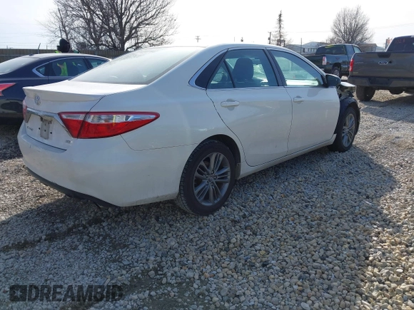 2015 Toyota Camry XLE with VIN 4T1BF1FK6FU475672, listed as a IAAI auction lot 41780890 with 238,915 mi miles. Bid and sale history available at carsss.com. Image 4.