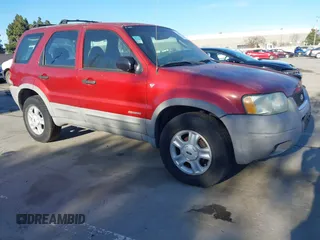 2001 Ford Escape XLT with VIN 1FMYU04151KC54900, listed as a IAAI auction lot 41546449 with 230,262 mi miles and . Bid and sale history available at DreamBid. Image 1.