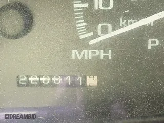 2000 GMC Denali with VIN 1GKEK13R1YR129862, listed as a IAAI auction lot 41833054 with 223,811 mi miles. Bid and sale history available at carsss.com. Image 7.