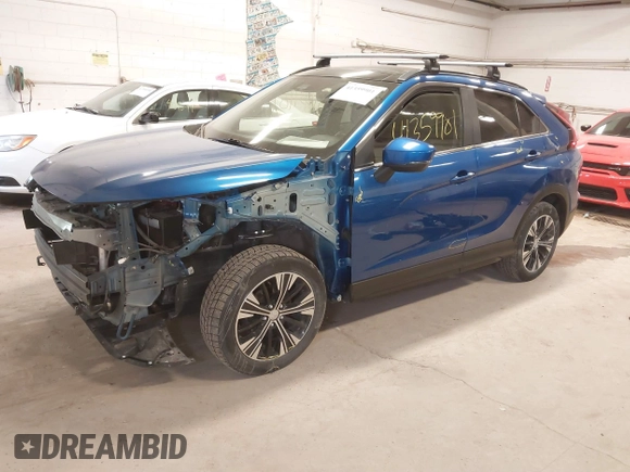 2022 Mitsubishi Eclipse Cross SE z VIN JA4ATWAAXNZ057521, wystawiony jako IAAI lot #41359901 z przebiegiem 60 227 mil mil oraz . Historia ofert i sprzedaży dostępna na DreamBid. Obrazek 2.