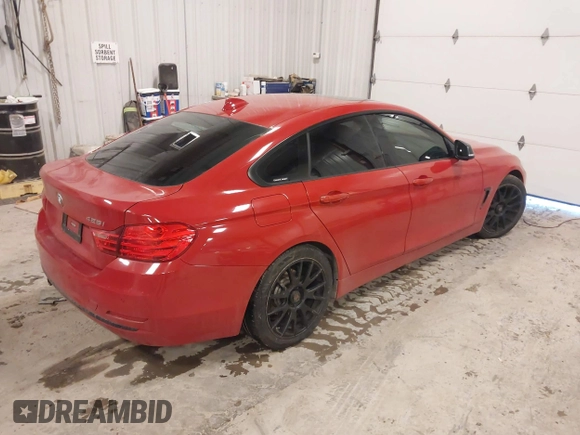 2015 BMW 4 Series 428i with VIN WBA4A9C52FGL85049, listed as a IAAI auction lot 41649475 with 100,443 mi miles and . Bid and sale history available at DreamBid. Image 4.