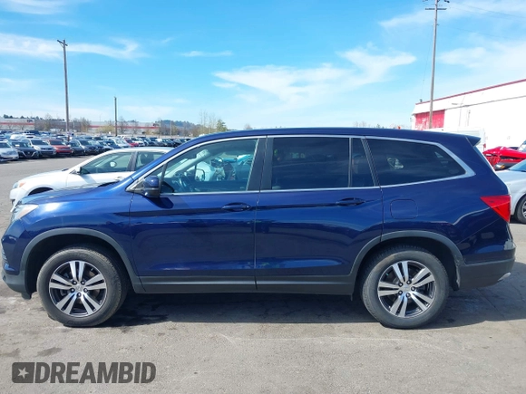 2016 Honda Pilot EX-L with VIN 5FNYF6H5XGB102213, listed as a IAAI auction lot 41861702 with 119,655 mi miles. Bid and sale history available at carsss.com. Image 14.