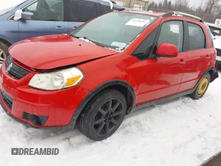 2009 Suzuki SX4 Man Touring Pkg AWD with VIN JS2YB417295101711, listed as a IAAI auction lot 41454641 with 200,540 mi miles. Bid and sale history available at carsss.com. Image 2.
