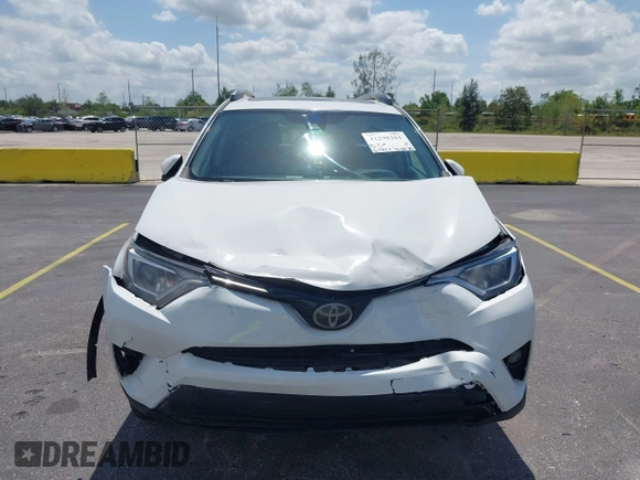 2018 Toyota RAV4 XLE with VIN 2T3WFREV9JW490324, listed as a IAAI auction lot 42298261 with 167,727 mi miles and . Bid and sale history available at DreamBid. Image 12.