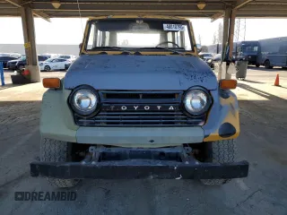 1974 Toyota Land Cruiser z VIN FJ5546419, wystawiony jako Copart lot #48010795 z przebiegiem 85 596 mil mil oraz Czysty tytuł • Clean title. Historia ofert i sprzedaży dostępna na DreamBid. Obrazek 5.