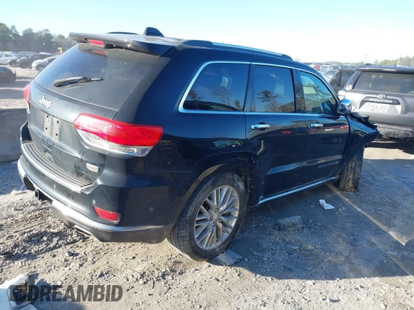 2018 Jeep Grand Cherokee Summit with VIN 1C4RJFJG1JC211047, listed as a IAAI auction lot 41133865 with 66,588 mi miles and . Bid and sale history available at DreamBid. Image 4.