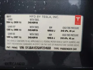 2017 Tesla Model S 100D with VIN 5YJSA1E26HF224568, listed as a IAAI auction lot 42140201 with 102,403 mi miles. Bid and sale history available at carsss.com. Image 9.