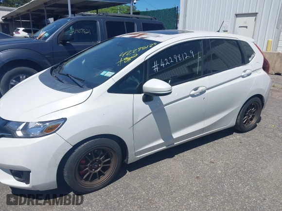 2015 Honda Fit EX z VIN 3HGGK5G84FM733886, wystawiony jako IAAI lot #42298129 z przebiegiem 84 383 mil mil oraz . Historia ofert i sprzedaży dostępna na DreamBid. Obrazek 14.