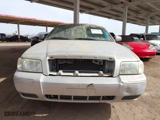 2006 Mercury Grand Marquis GS with VIN 2MEFM74VX6X638763, listed as a IAAI auction lot 41735612 with 123,914 mi miles. Bid and sale history available at carsss.com. Image 6.
