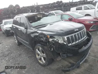 2012 Jeep Grand Cherokee Limited z VIN 1C4RJEBG4CC263851, wystawiony jako IAAI lot #42223939 z przebiegiem 255 962 mil mil oraz . Historia ofert i sprzedaży dostępna na DreamBid. Obrazek 1.