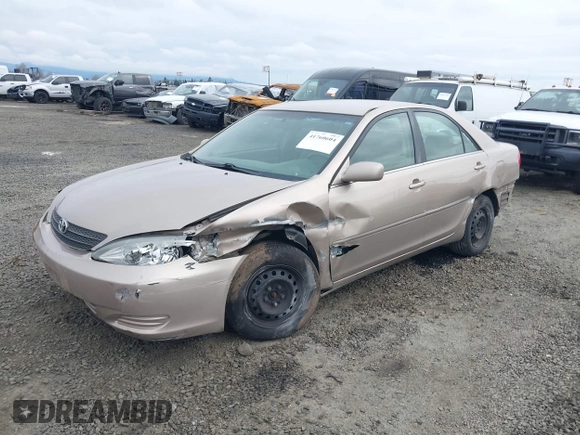 2002 Toyota Camry LE z VIN 4T1BE32K72U028489, wystawiony jako IAAI lot #41760604 z przebiegiem 163 950 mil mil oraz . Historia ofert i sprzedaży dostępna na DreamBid. Obrazek 18.
