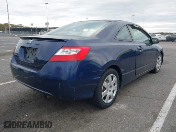 2008 Honda Civic Cpe LX with VIN 2HGFG12608H530474, listed as a IAAI auction lot 42084035 with 182,037 mi miles. Bid and sale history available at carsss.com. Image 4.
