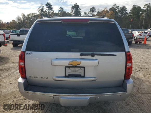 2014 Chevrolet Suburban LTZ with VIN 1GNSCKE02ER141764, listed as a Copart auction lot 85005524 with 234,019 mi miles and Salvage title. Bid and sale history available at DreamBid. Image 6.