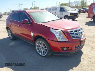 2014 Cadillac SRX Premium Collection z VIN 3GYFNDE35ES665573, wystawiony jako IAAI lot #41850376 z przebiegiem 111 727 mil mil oraz . Historia ofert i sprzedaży dostępna na DreamBid. Obrazek 1.