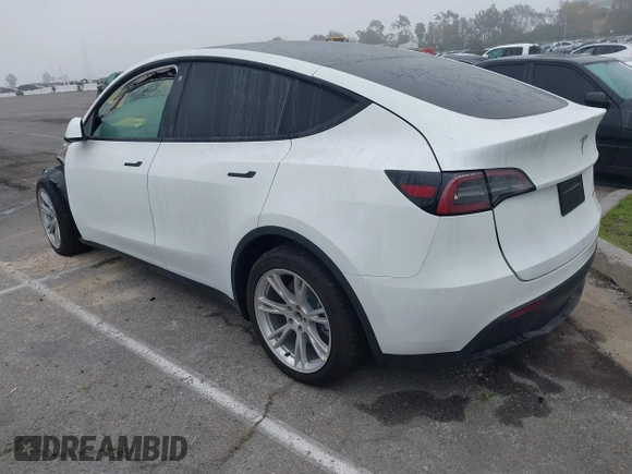 2022 Tesla Model Y Long Range z VIN 7SAYGDEE4NF315356, wystawiony jako IAAI lot #41571151 z przebiegiem 1 056 mil mil oraz . Historia ofert i sprzedaży dostępna na DreamBid. Obrazek 3.
