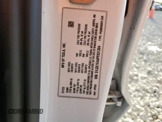 2023 Tesla Model 3 with VIN 5YJ3E1EA4PF631304, listed as a Copart auction lot 52500695 with 33,024 mi miles and Salvage title. Bid and sale history available at DreamBid. Image 15.