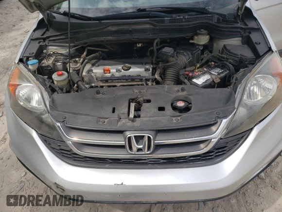 2011 Honda CR-V LX z VIN 5J6RE4H39BL026381, wystawiony jako Copart lot #56586155 z przebiegiem 285 041 mil mil oraz Szkoda całkowita • Salvage title. Historia ofert i sprzedaży dostępna na DreamBid. Obrazek 11.