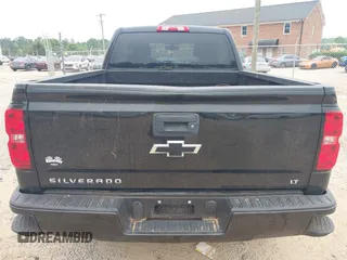 2016 Chevrolet Silverado 1500 LT with VIN 1GCVKREC4GZ113687, listed as a IAAI auction lot 42107434 with 95,577 mi miles and . Bid and sale history available at DreamBid. Image 16.