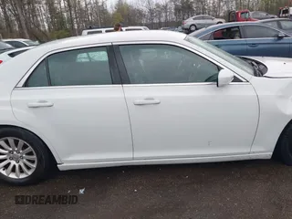 2014 Chrysler 300 with VIN 2C3CCAAG5EH128036, listed as a IAAI auction lot 41988327 with 153,809 mi miles. Bid and sale history available at carsss.com. Image 13.
