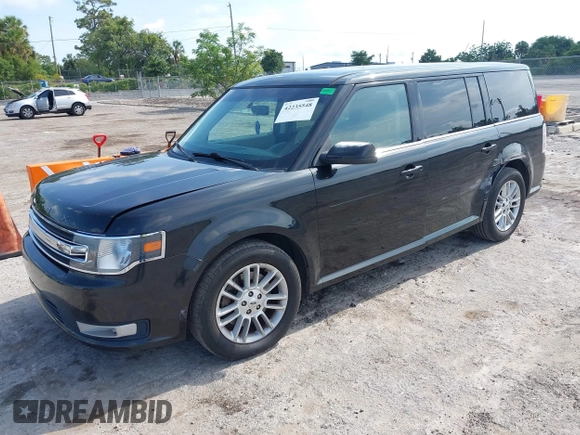 2014 Ford Flex SEL z VIN 2FMGK5C8XEBD13484, wystawiony jako IAAI lot #42235548 z przebiegiem 172 570 mil mil oraz . Historia ofert i sprzedaży dostępna na DreamBid. Obrazek 18.