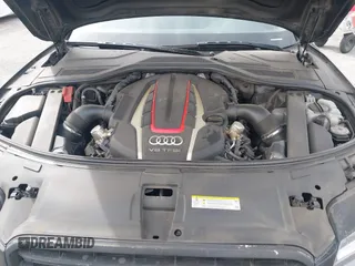 2013 Audi S8 with VIN WAUD2AFD0DN028673, listed as a IAAI auction lot 41689320 with 115,502 mi miles. Bid and sale history available at carsss.com. Image 10.