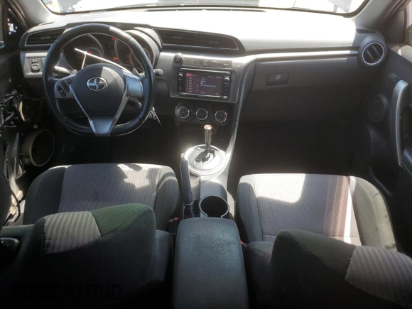 2015 Scion tC z VIN JTKJF5C76FJ010813, wystawiony jako Copart lot #58987575 z przebiegiem 108 709 mil mil oraz Szkoda całkowita • Salvage title. Historia ofert i sprzedaży dostępna na DreamBid. Obrazek 8.