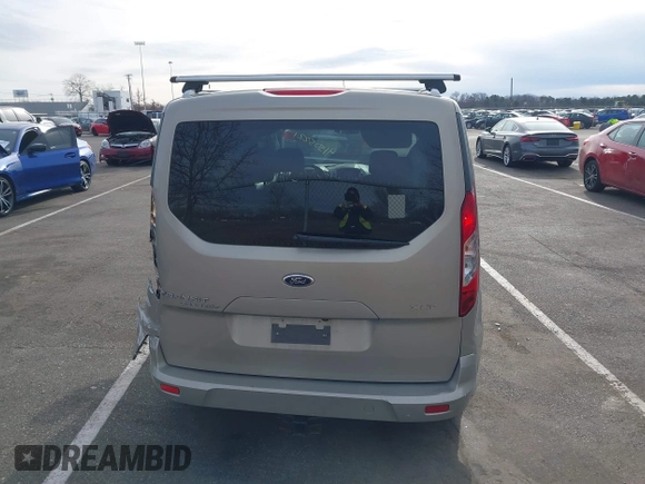 2015 Ford Transit Connect XLT z VIN NM0AE8F74F1179538, wystawiony jako IAAI lot #41505221 z przebiegiem 57 798 mil mil oraz . Historia ofert i sprzedaży dostępna na DreamBid. Obrazek 16.
