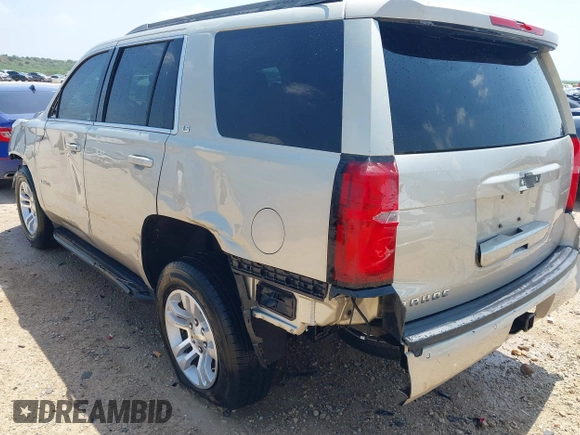 2015 Chevrolet Tahoe LS with VIN 1GNSCAKC9FR294832, listed as a IAAI auction lot 39274877 with 126,932 mi miles and . Bid and sale history available at DreamBid. Image 13.