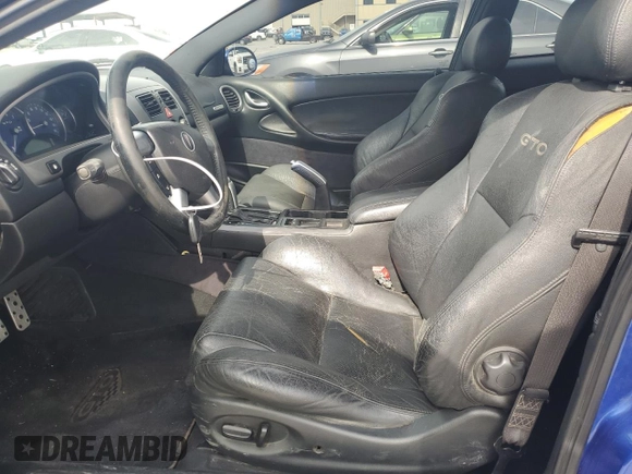 2004 Pontiac GTO with VIN 6G2VX12G84L287388, listed as a Copart auction lot 53463805 with 163,599 mi miles and Salvage Title. Bid and sale history available at carsss.com. Image 7.