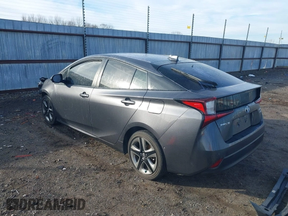 2021 Toyota Prius L Eco z VIN JTDKAMFU1M3149965, wystawiony jako IAAI lot #38641916 z przebiegiem 69 942 mil mil oraz . Historia ofert i sprzedaży dostępna na DreamBid. Obrazek 3.